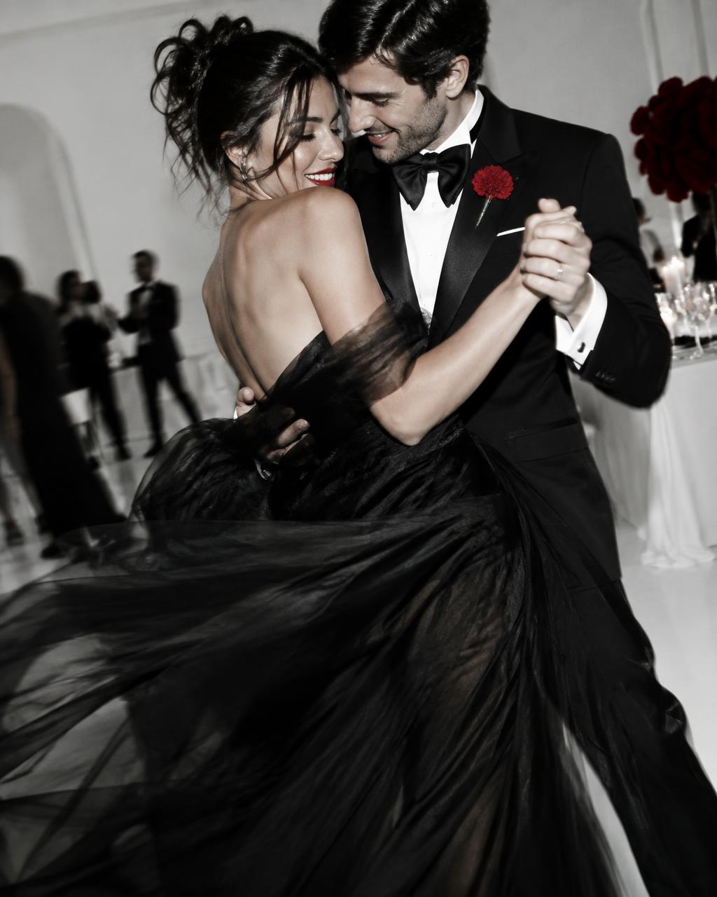 A couple dancing together at their reception
